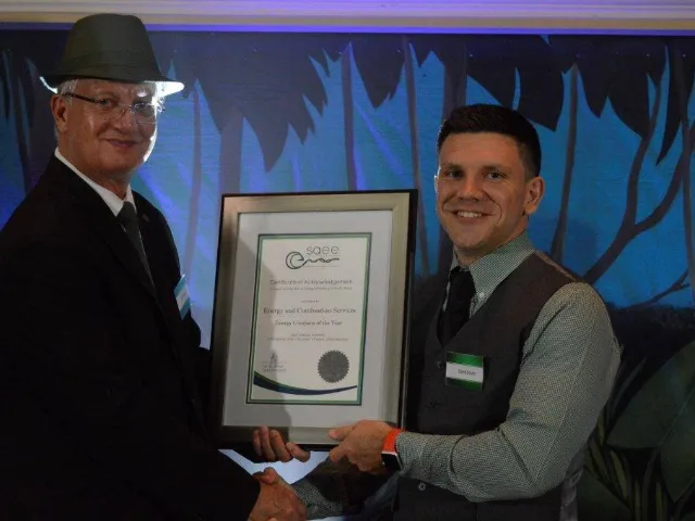 ECS receiving the Energy Company of the Year award